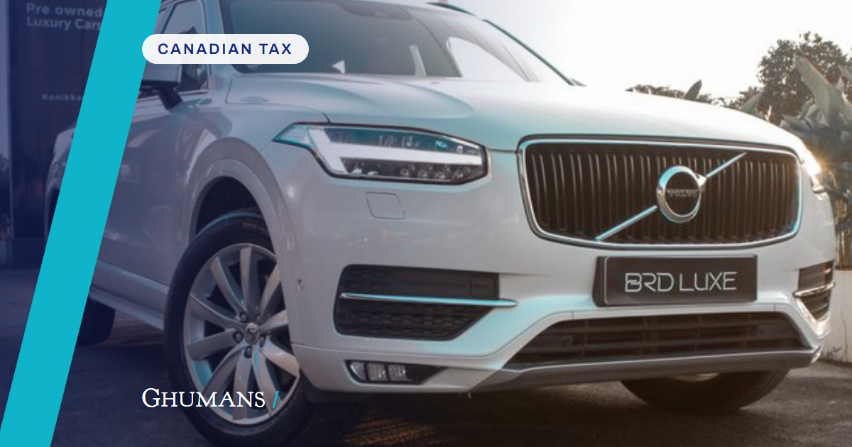 A sophisticated white luxury SUV showcased outdoors at a dealership.